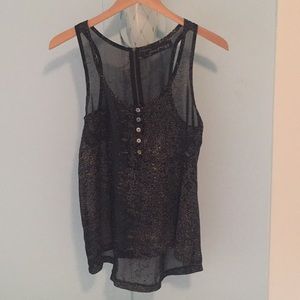 Black tank with gold and silver dots and zipper